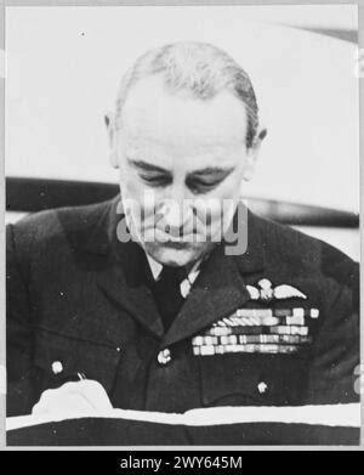  RAF Air Marshal Arthur Coningham sits in a Rhineland farmyard watching the Operation Varsity Allied air armada
