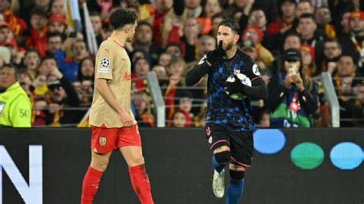 Ramos ran out in front of the Atletico fans with his Sevilla team-mates