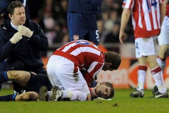  Ramsey writhed with agony as his teammates watched on in horror