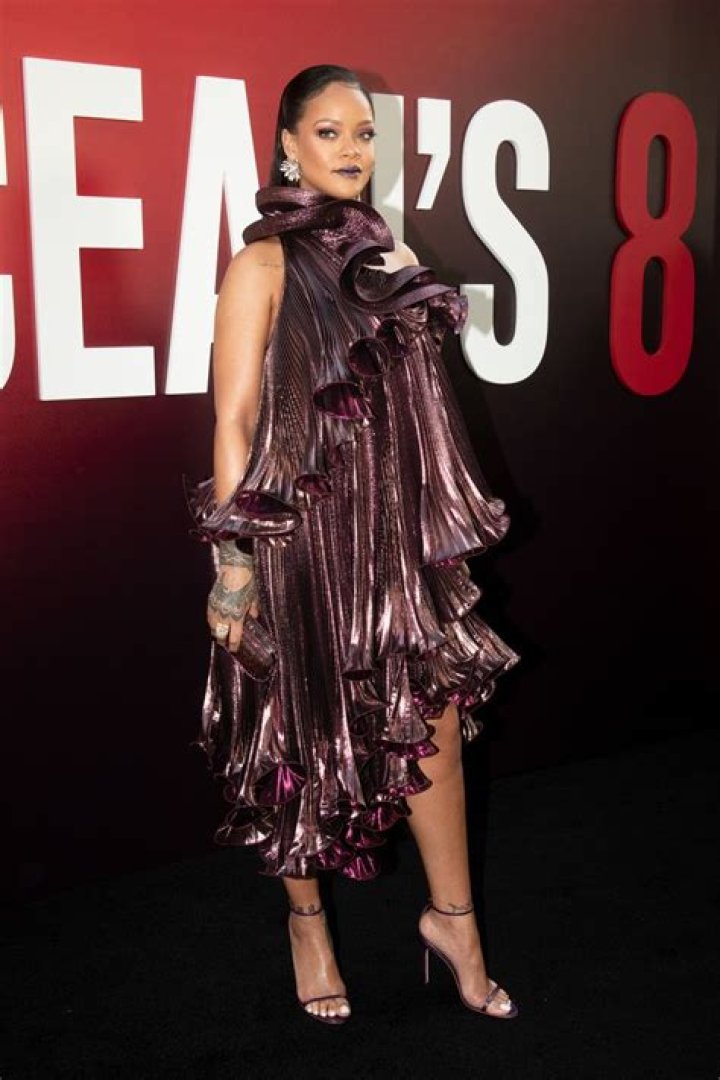 Rihanna looks incredible in red lace lingerie as she models Savage x Fenty's Valentine's Day collection