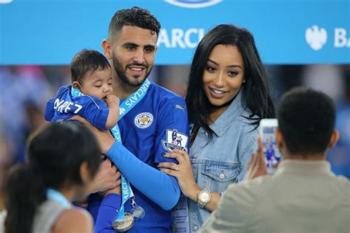 Riyad and Rita celebrate with the Premier League trophy