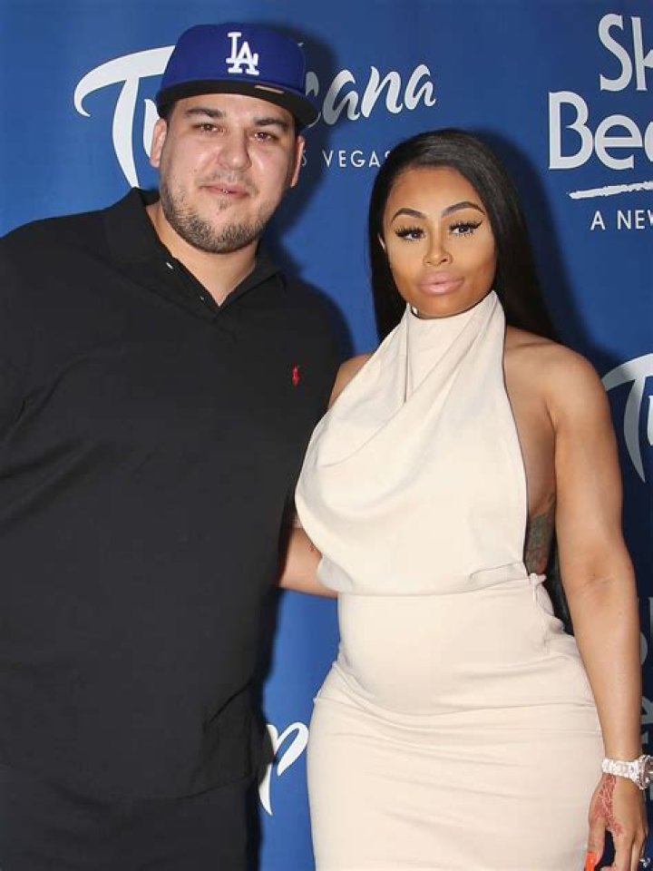 Rob Kardashian (right) and Blac Chyna at her birthday celebration