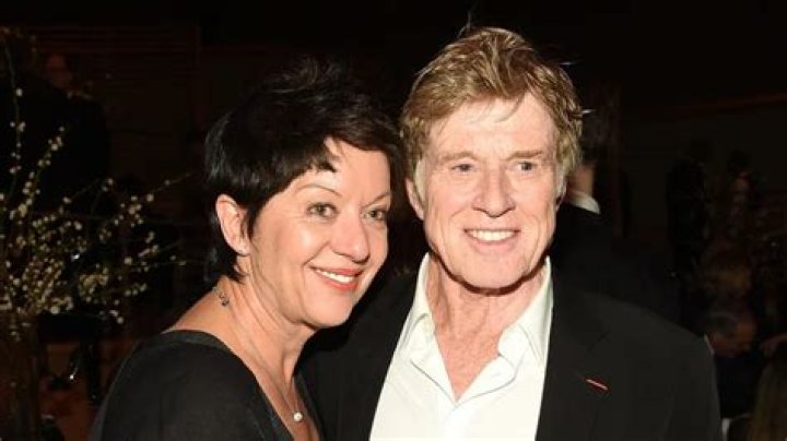 Robert Redford and his wife Sibylle Szaggars posing on the red carpet