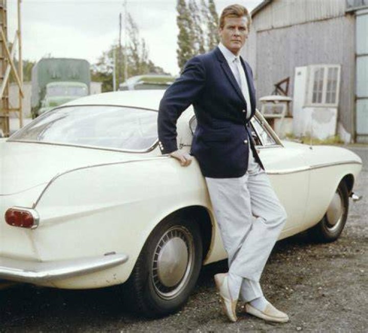 Roger Moore owned a Volvo P1800, like this one he posed with while making The Saint in the 1960s