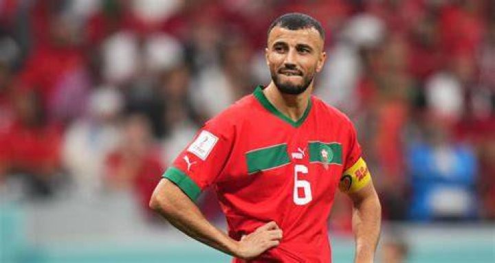 Romain Saiss' wife Salma waves the Moroccan flag high