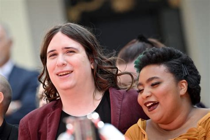 Ruby Guest and her wife, Kynthia, embrace after getting married