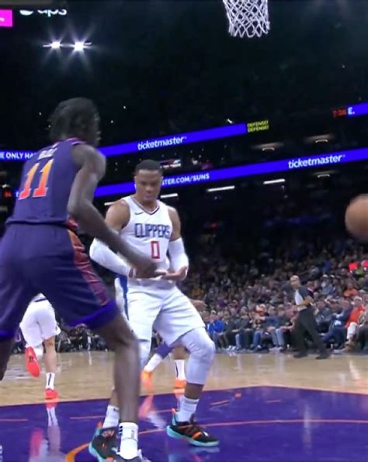 Russ rocked the baby on Bol Bol after beating him for a layup