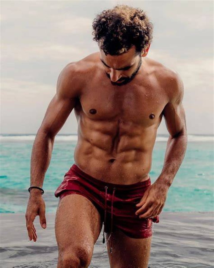 Salah dons swimming trunks and shows off a six-pack on Instagram