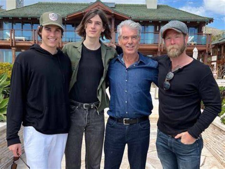 Sean, seen second from right in a blue shirt, said he had been 'hit by a truck'