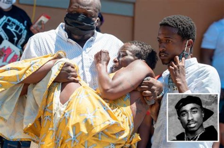 Sekyiwa Shakur is carried away after speaking to protesters in Marin City, California