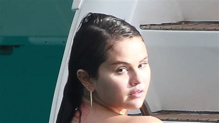 Selena Gomez - bikini (with guy)