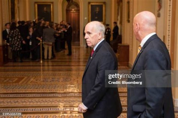 Senate Sergeant at Arms Michael Stenger walks the halls of the U.S. Capitol