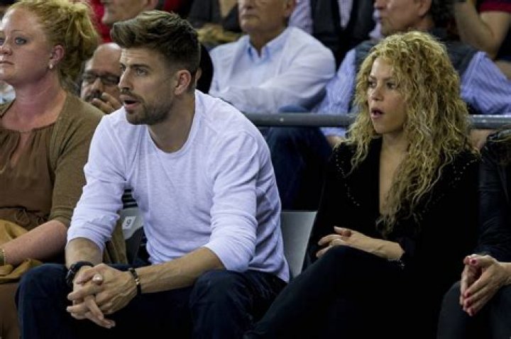 Shakira with Gerard, his brother Marc (left) and parents Joan Pique and Montserrat Bernabeu, in 2013