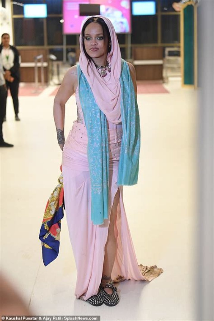 She also donned a pink corset with a long train in the photos