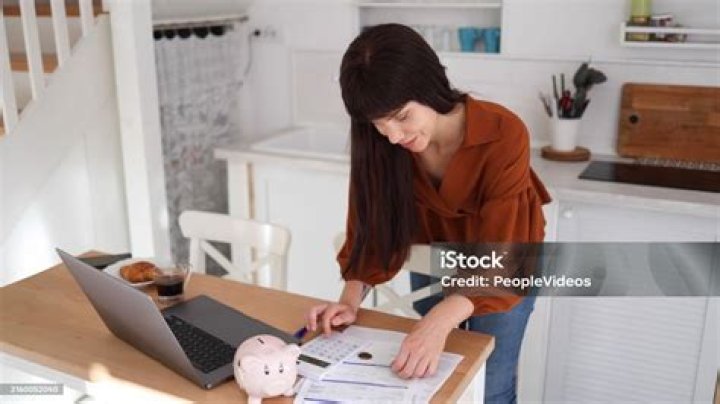 She saved money by doing the work herself and keeping the vanity unit, floor tiles and shower