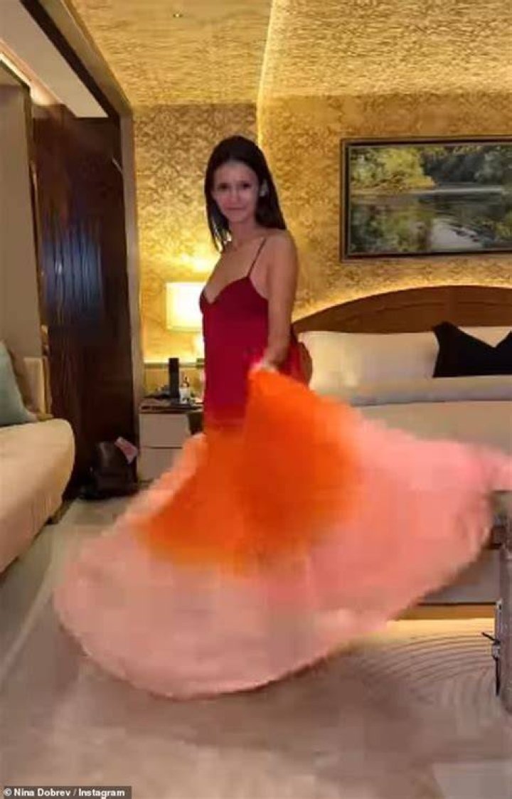 She twirled in front of the camera while dancing to her song Let's Get Loud