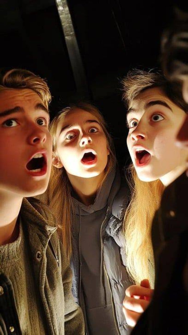 Shocked friends gather outside the shooting scene yesterday