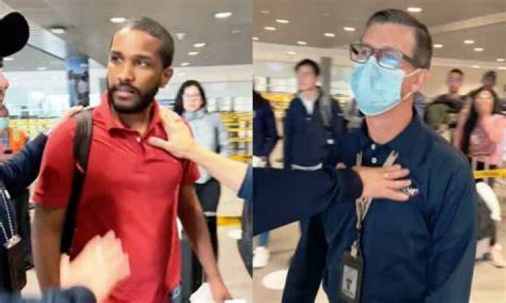 Shocking video shows the traveler go behind the desk before picking up a box to launch
