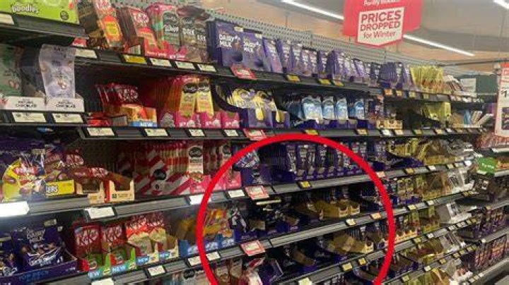 Shoppers are seen scrambling over items in a Walmart store