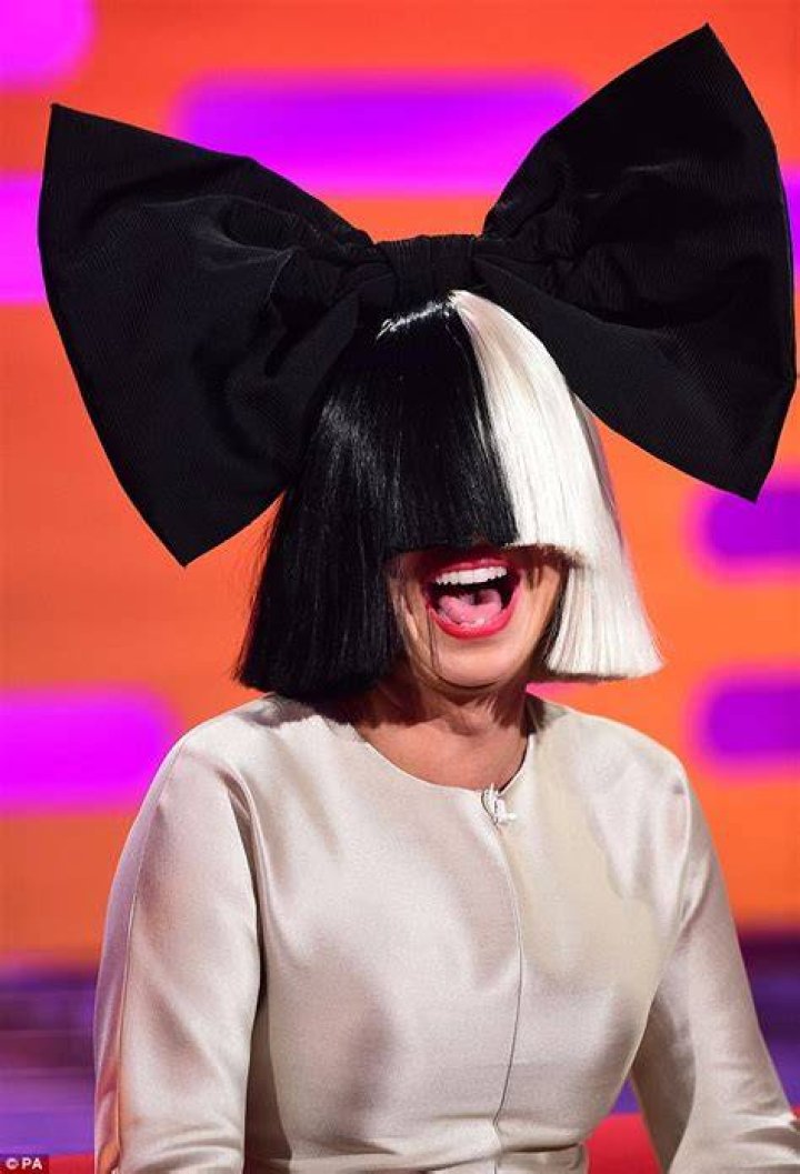  Sia wears a wig across her face in live appearances but has often been seen without