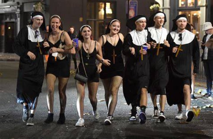 Some revellers dressed down as they dressed up, with one woman donning fishnet tights for her bunny costume