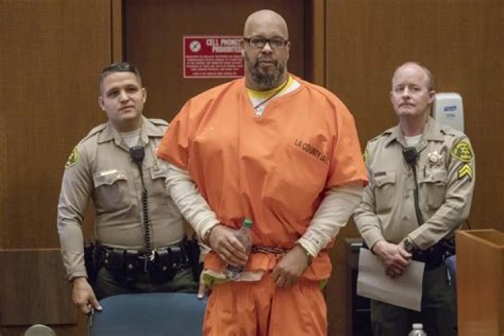 Suge Knight's BMW was riddled with bullets by gunmen in a white Cadillac