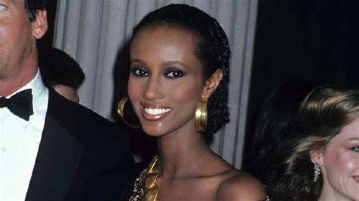 Supermodel Iman stunned with a dramatic feathered dress and headpiece