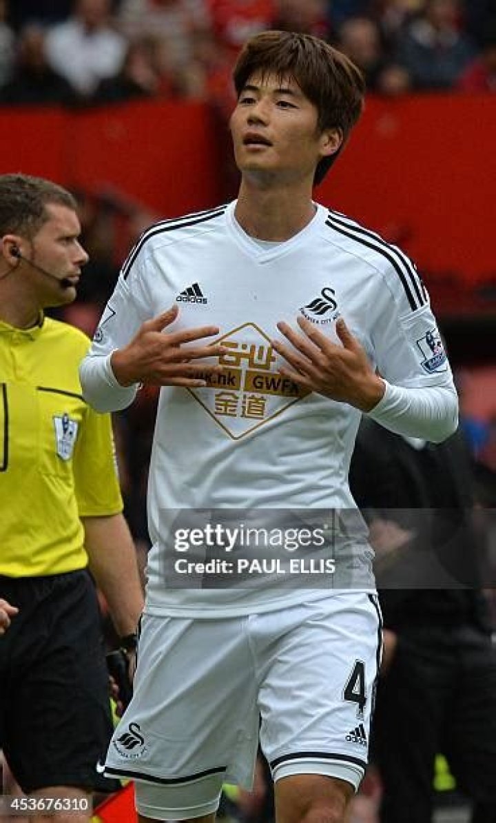  Swansea midfielder Ki Sung-Yueng will face his South Korean team-mate in the FA Cup on Saturday