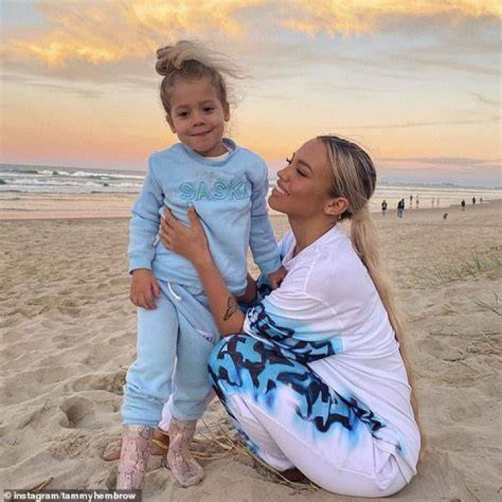 Tammy Hembrow shared an adorable photo of her two older children holding their new baby sister