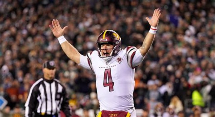 Taylor Heinicke celebrated on the Washington team plane home from Philadelphia