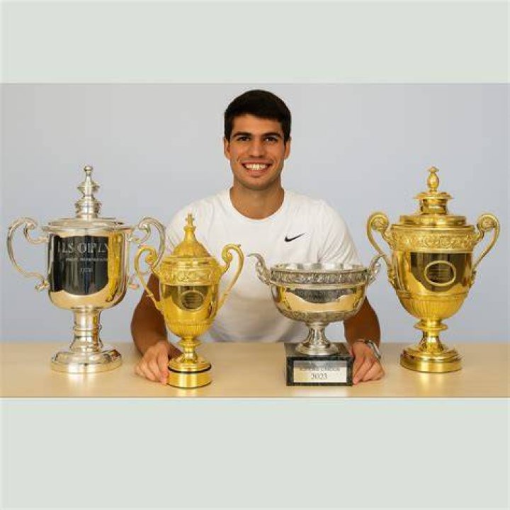 Tennis trophies sit proudly on display on Williams' fireplace