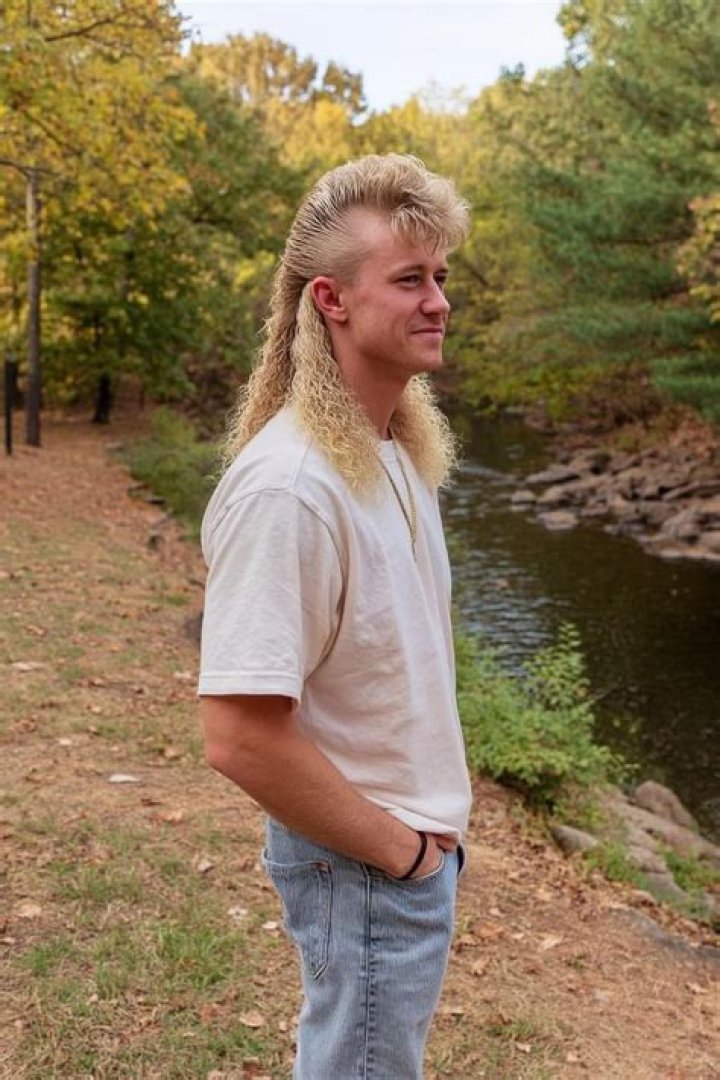 The blond mullet-haired zookeeper used to sing about his arch-enemy