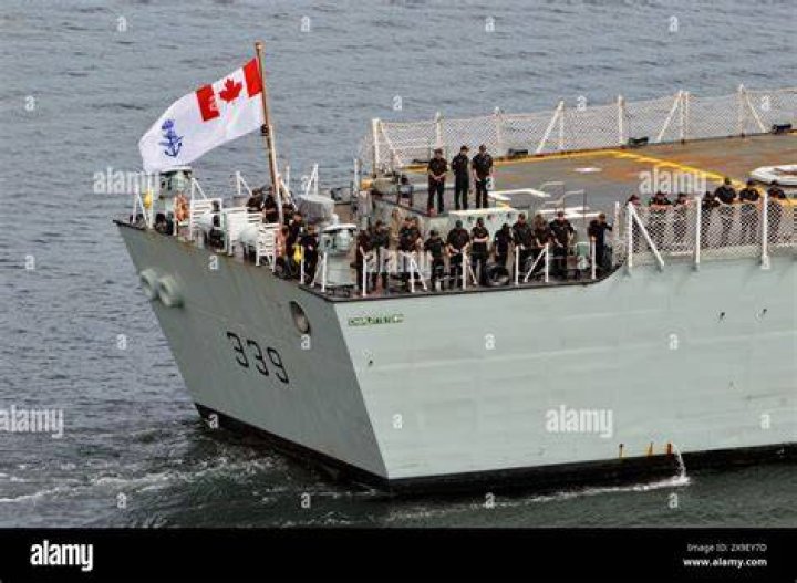 The Canadian was pictured in the ocean alongside her NFL star beau Mason Rudolph