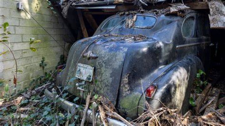 The car was found abandoned with all three children inside and unharmed