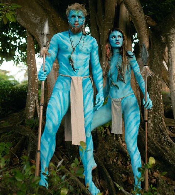 The celebrity couple stripped naked covered themselves in blue paint