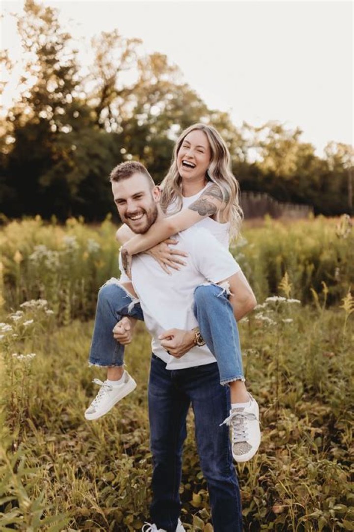 The couple posed for photos on a beach