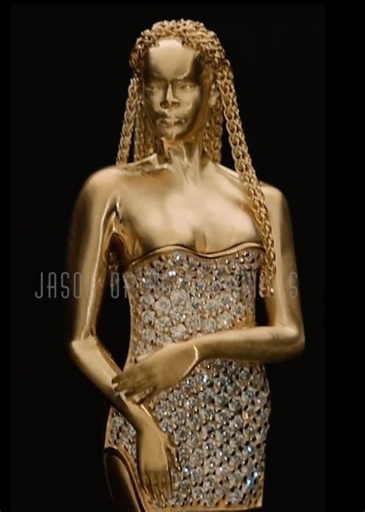 The Diamonds singer covered up with a series of strategically placed belts