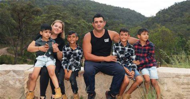The Elfalak family with dad Anthony, mum Kelly, AJ (pictured centre) and his two brothers