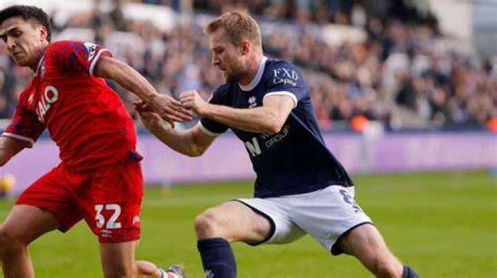 The ex-Millwall ace was reportedly seen 'swigging champagne' at the wheel of her luxry Range Rover at the start of Decemeber
