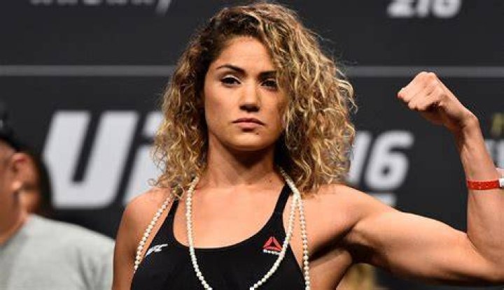 The ex-UFC star will lead fans through one month - and one flower or bikini - at a time