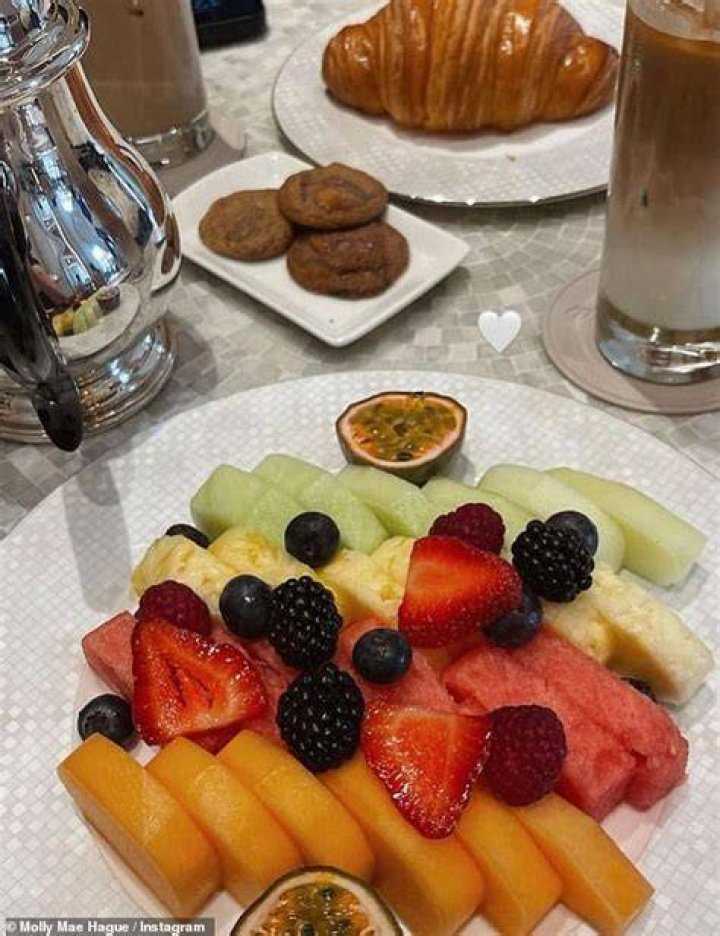 The family tucked into fruit and pastries