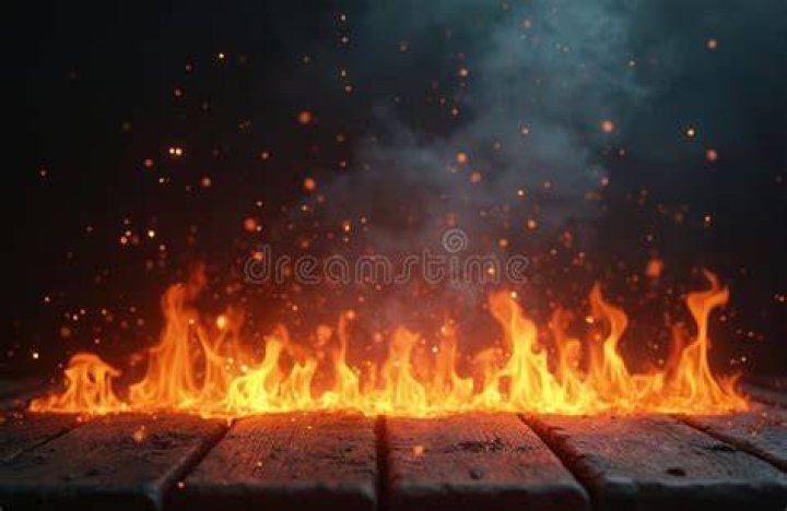 The flames then spread to the side of the car