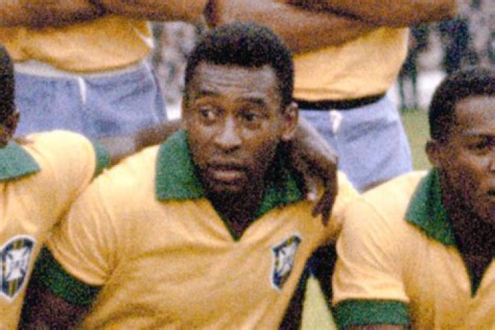 The footballing legend was hoisted into the air by his team-mates