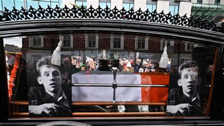 The funeral procession of Shane MacGowan makes its way through the streets of Dublin