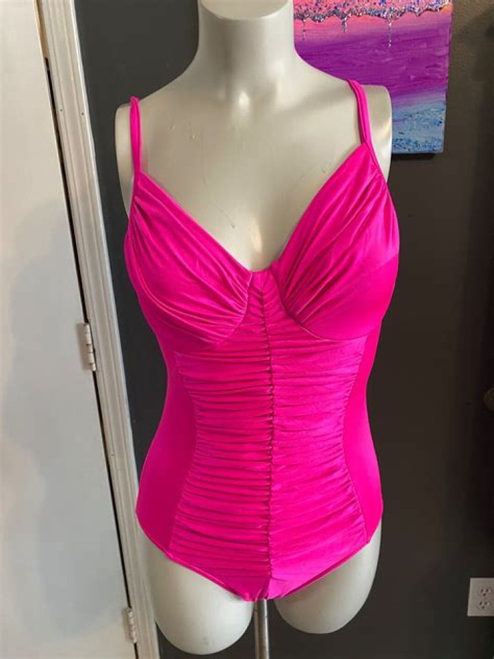 The hot pink one-piece swimsuit was backless