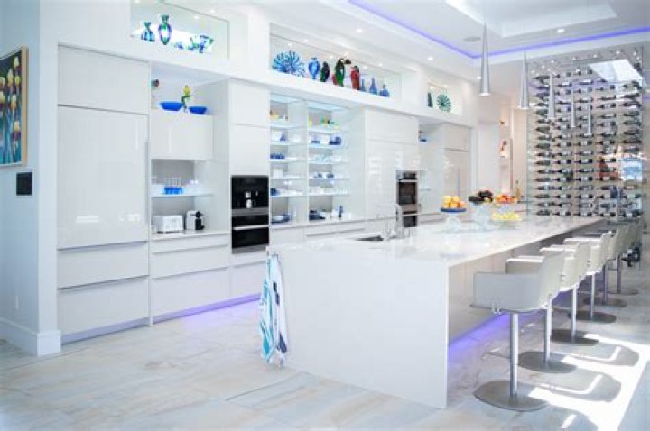 The kitchen has a huge granite island