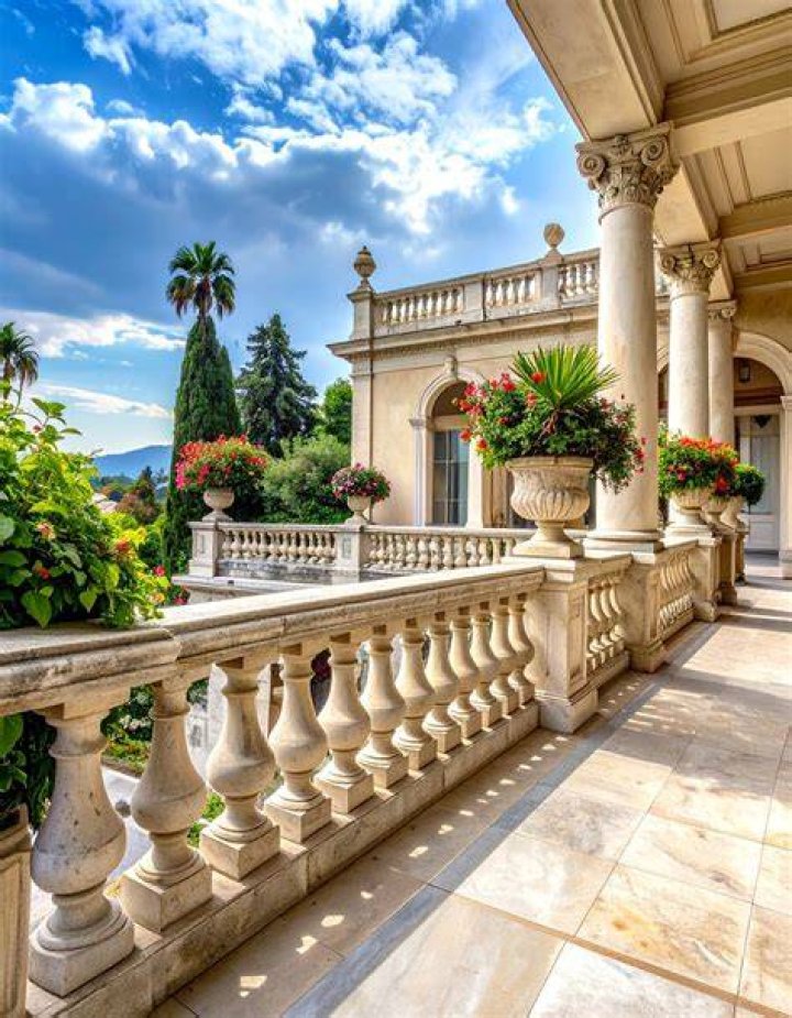 The mansion has a balcony for dogs to look out on