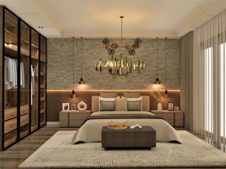 The master bedroom also comes equipped with a jacuzzi, which is conveniently located next to a fireplace and two large windows