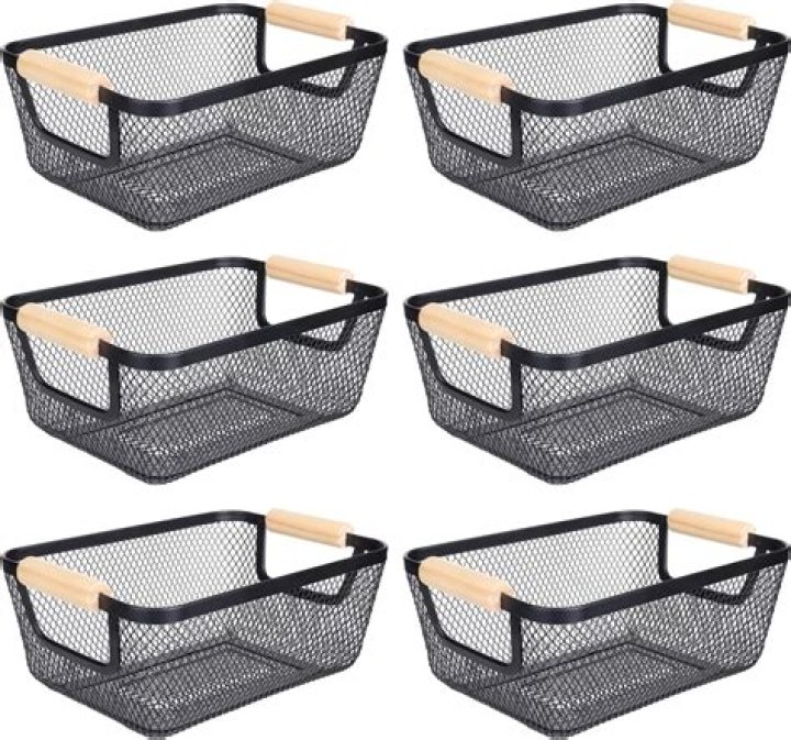 The mesh baskets, with wooden handles, look nearly identical to Ikea's version
