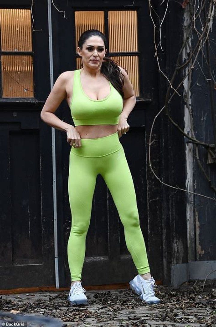 The model exhibited her sporty side with a playful pink set and boxing gloves